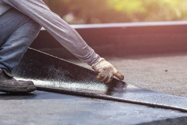 Professional Exterior Waterproofing technician working in Oakwood, GA
